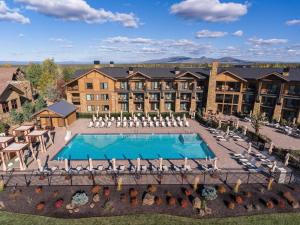 an aerial view of a hotel with a swimming pool at Upscale 3 BR Townhouse @ Juniper Preserve Resort in Bend