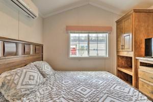 a bedroom with a bed and a window at Tranquil Trails Cabin & Suites Spring Midweek 35 Off in Pleasant Mount