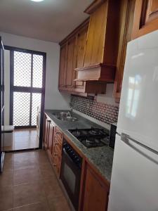 Kuchyň nebo kuchyňský kout v ubytování Atlanterra Playa 4 + 6 fotografií