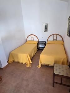 Postel nebo postele na pokoji v ubytování Atlanterra Playa 4