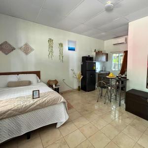 Ένα ή περισσότερα κρεβάτια σε δωμάτιο στο La ceibasurf