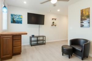 a waiting room with a desk and a chair at Dillon Ave Homes in Cheyenne