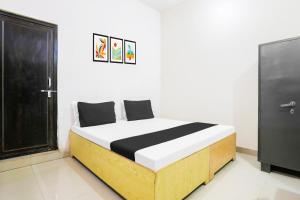 Ένα ή περισσότερα κρεβάτια σε δωμάτιο στο Hotel O CityMax