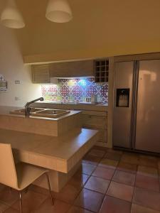 Η κουζίνα ή μικρή κουζίνα στο Casa Bacardi