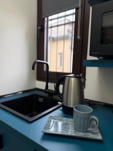 Η κουζίνα ή μικρή κουζίνα στο Upper Floor Passerini