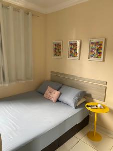 En eller flere senge i et værelse på Apartamento COP30