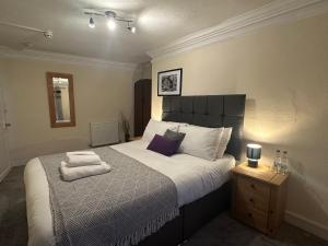 Postel nebo postele na pokoji v ubytování The Cleave Inn