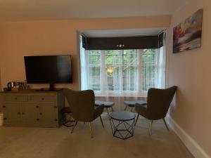 TV a/nebo společenská místnost v ubytování The Cleave Inn