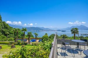 a balcony with a view of a lake at Villa Anna Isole Borromee in Baveno