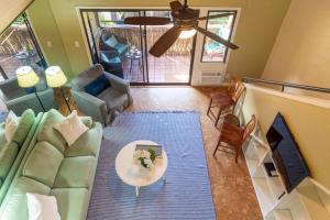a living room with a couch and a table at Kihei Resort 202 · KRS 202 Family Getaway 2BD w AC Pool Beach in Kihei