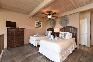 Katil atau katil-katil dalam bilik di Napili Point C21 · NP C21 OceanFront 2BD Condo w AC Ocean Views +56 gambar