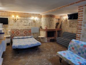 Μια τηλεόραση ή/και κέντρο ψυχαγωγίας στο Travel Solution - Seaview & Roman Apartments