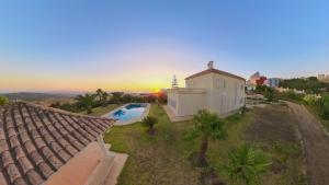 an aerial view of a house with a swimming pool at Exclusive HUGE SeaView Villa Tanger w Private Pool in Noûnouech