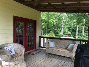 A balcony or terrace at Cozy Cabin Rental near Ozark National Forest for a Relaxing Weekend Getaway in Arkansas