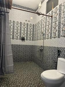 Koupelna v ubytování 4elementis beach homestay