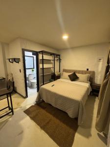 Postel nebo postele na pokoji v ubytování La Aldea