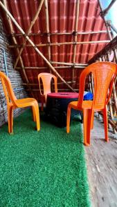 Posezení v ubytování SERENITY BAY HOME 2bhk