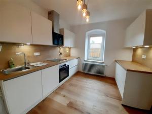 Kuchyň nebo kuchyňský kout v ubytování Helle Altbauwohnung