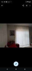 a picture of a bedroom with a bed and a window at Casa Cop 30 Belém in Belém