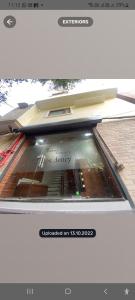 a close up of a car rear view window at Sonu luxury residency hotel in Amritsar