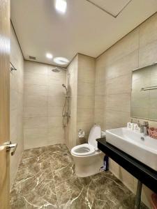 Koupelna v ubytování FLC Sea Tower - Kimi Apartment + 22 fotografií