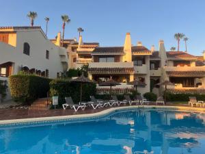 a view of the resort from the pool at La Manga Club, Las Palmeras 12 in Cartagena