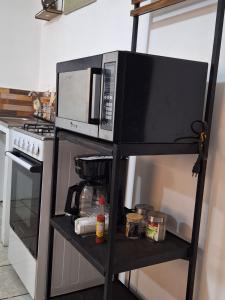 Kuchyň nebo kuchyňský kout v ubytování Apartamento Colonial in Ataco