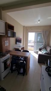 Køkken eller tekøkken på Apartment 201 Farol de Santa Marta