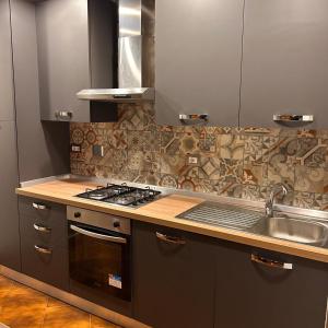 Kuchyň nebo kuchyňský kout v ubytování Grottaferrata Haven