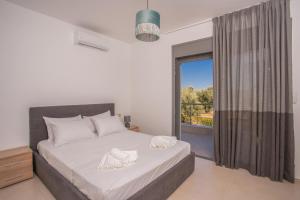 Postel nebo postele na pokoji v ubytování Valora Villa