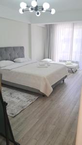 Ένα ή περισσότερα κρεβάτια σε δωμάτιο στο Airport RMO