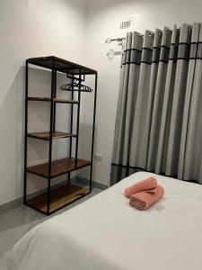 Postel nebo postele na pokoji v ubytování Kafusi Lodge