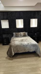 Ένα ή περισσότερα κρεβάτια σε δωμάτιο στο Casa Grande