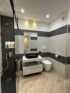 Ένα μπάνιο στο Parco di Veio Luxury Apartment