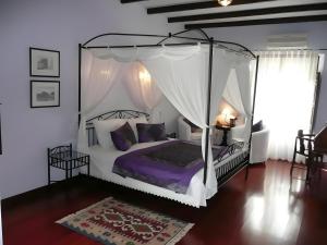 Postel nebo postele na pokoji v ubytování Cortijo puertoelperal + 13 fotografií