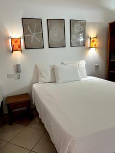 Postel nebo postele na pokoji v ubytování Pousada e Residencial Villafranca