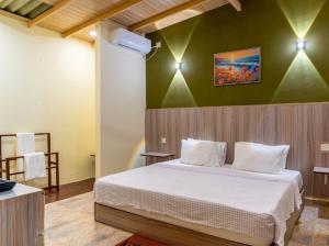 Postel nebo postele na pokoji v ubytování Airport Lounge by Sandamalee