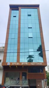 a building with a sign on the front of it at Hotel Bodhi Heritage And Restaurant in Gaya