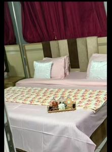 Postel nebo postele na pokoji v ubytování RESIDENCE Sidi + 6 fotografií