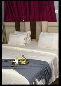 Postel nebo postele na pokoji v ubytování RESIDENCE Sidi