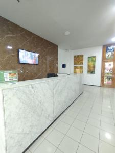 Ο χώρος του λόμπι ή της ρεσεψιόν στο Flat Bellagio - BEIRA MAR - com localização super privilegiada!