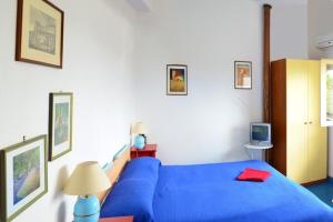 Vuode tai vuoteita majoituspaikassa Eurialo Green Suites