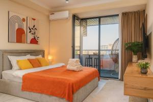 Postel nebo postele na pokoji v ubytování Luxury apartment with a view of Tashkent City NRG U-Tower + 28 fotografií