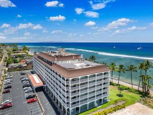 an aerial view of a building next to the ocean at Lahaina Shores 306 · LS 306 Dream Maui Studio by the Beach Pool in Wainee