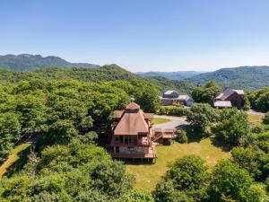 an overhead view of a house in the trees at Endless Vistas in Seven Devils