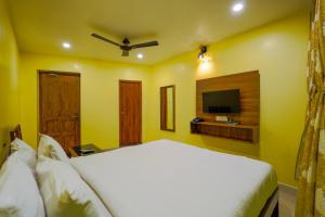 TV a/nebo společenská místnost v ubytování White yellow residency