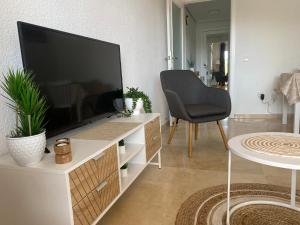 Μια τηλεόραση ή/και κέντρο ψυχαγωγίας στο Capitolio 1G