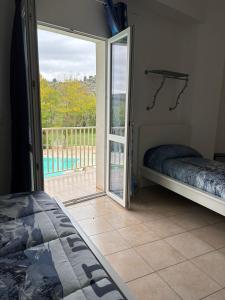 Ένα ή περισσότερα κρεβάτια σε δωμάτιο στο B&B RosAngelo