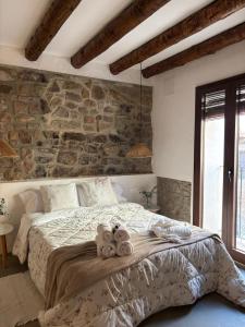 Ένα ή περισσότερα κρεβάτια σε δωμάτιο στο ruralhomemora