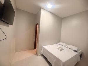 TV a/nebo společenská místnost v ubytování Sky Hotel Ltda